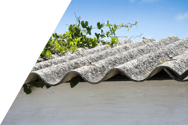 Asbestos on roof with blue sky in the background
